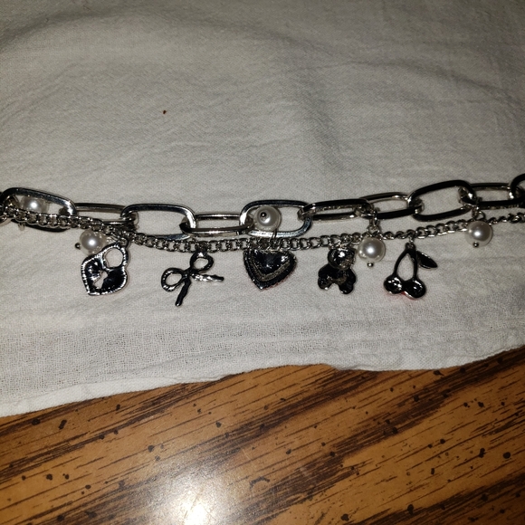 Super Cute Girlie Charm Bracelet Silvertone from our local boutique - Picture 4 of 7